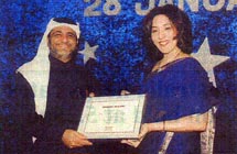 Salim Altoki of freight forwarders Altoki Group receiving his award from Maersk UAE, Qatar and Oman Managing Director Poonam Datta
