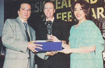Poonam Datta giving awards